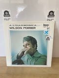 Wilson Poirier a l'harmonica